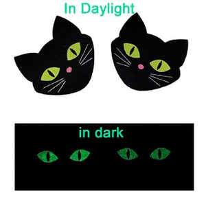pezoneras de gatito negro que brillan 